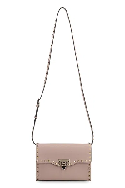Valentino Garavani Rockstud Piccola Leather Crossbody Bag In Pink