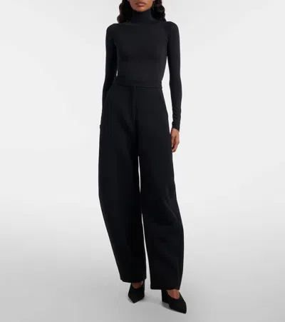 Alaïa High-rise Round Wide-leg Crepe Pants In Black