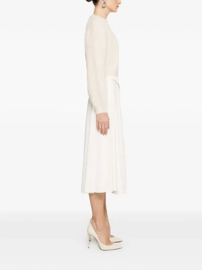 Nissa Buttoned Asymmetric Skirt In White