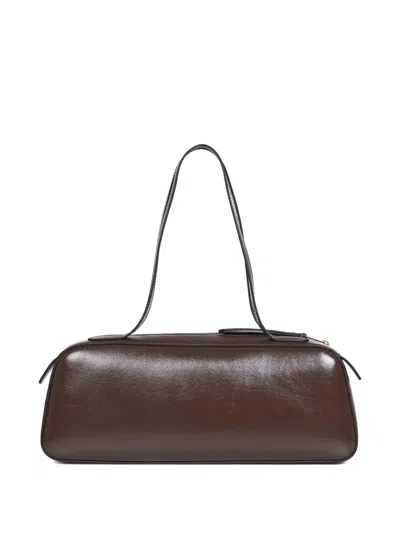 Khaite Simona Crackle Patent Elongated Tote Bag In Brown