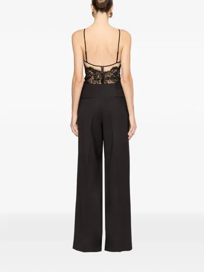 Nissa Button-detail Trousers In Black