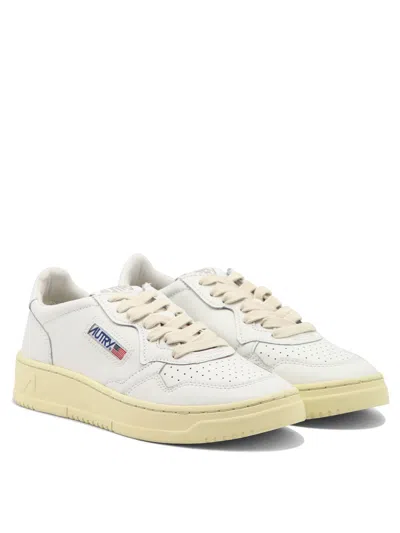 Autry Low-top Sneakers With Contrast Sole And Perforated Detailing In White
