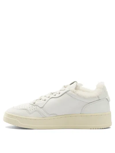 Autry Low-top Sneakers With Contrast Sole And Perforated Detailing In White
