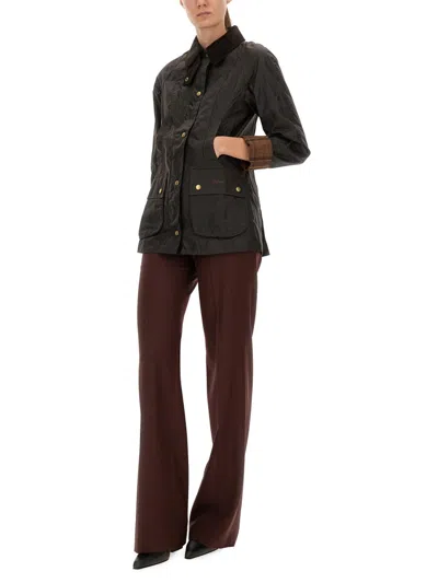 Barbour Buttoned Waxed Jacket In Black