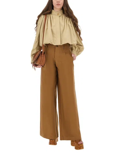 Chloé Pleated Garment-dyed Cotton-canvas Straight-leg Pants In Brown