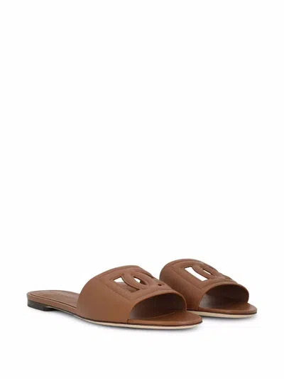 Dolce & Gabbana Slide Sandals With Cut Out Logo In Leather Woman In Brown