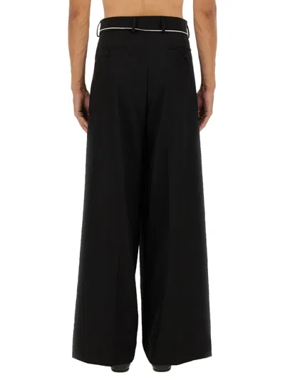 Dries Van Noten Wide-leg Trousers Featuring Pleated Front In Black