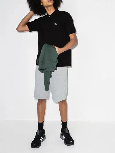 Lacoste Classic Fit Original L.12.12 Polo Clothing In Black