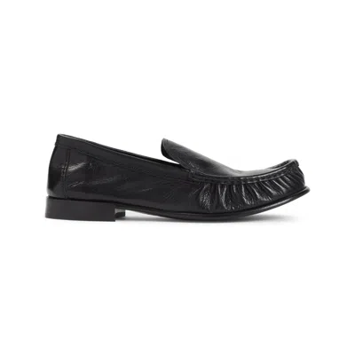 Miu Miu Loafers In Buffalo Leather With Embossed Stitching In Black
