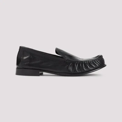 Miu Miu Loafers In Buffalo Leather With Embossed Stitching In Black