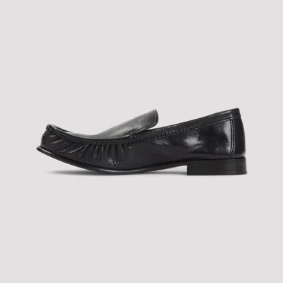 Miu Miu Loafers In Buffalo Leather With Embossed Stitching In Black
