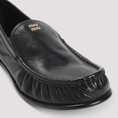 Miu Miu Loafers In Buffalo Leather With Embossed Stitching In Black