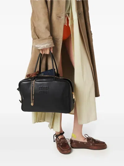 Miu Miu Black Bauletto Bag Zip Embossed Logo In Multi
