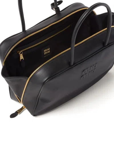 Miu Miu Black Bauletto Bag Zip Embossed Logo In Multi