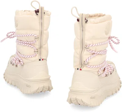 Moncler High Snow Boots Featuring Textured Outsole In Neutral