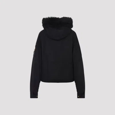 Moose Knuckles Fitted Hooded Jacket With Plush Fur Trim And Metallic Accents In Black