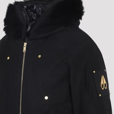 Moose Knuckles Fitted Hooded Jacket With Plush Fur Trim And Metallic Accents In Black