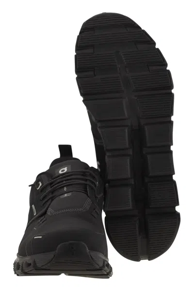 On Low-profile Sneakers With Segmented Sole And Reflective Accents In Black
