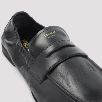 Prada Antique-inspired Loafers With Shuffle Screen Printed Logo In Black