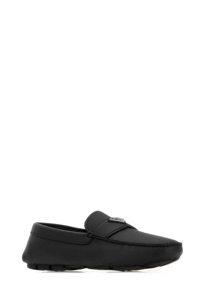 Prada Leather Loafers With Round Toe And Rubber Sole In Black