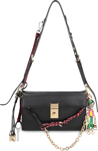 Prada Soft Sound Small Leather Shoulder Bag With Charms In Black