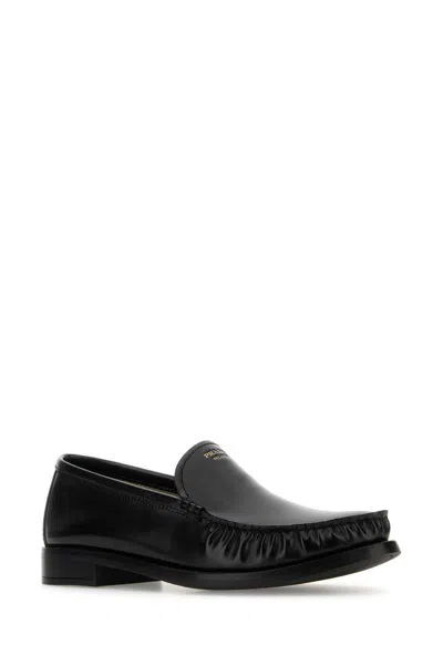 Prada Brushed Fumé Leather Loafers In Black