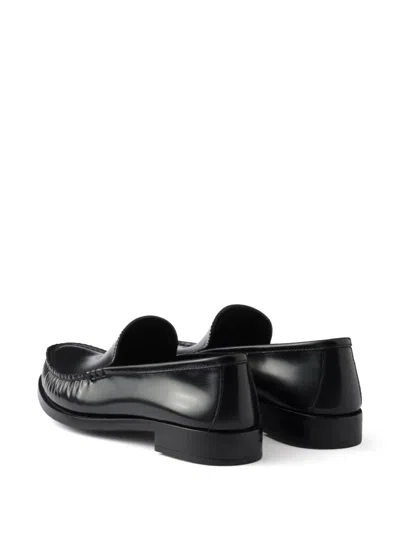Prada Brushed Fumé Leather Loafers In Black