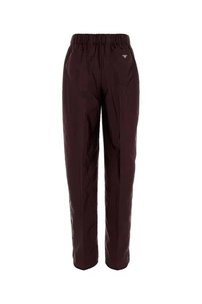 Prada Recycled Nylon Trousers Side Pockets In Brown