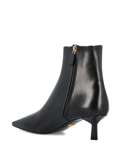 Prada Leather Pointed Ankle Boots In Black