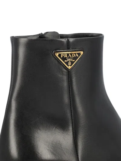 Prada Leather Pointed Ankle Boots In Black