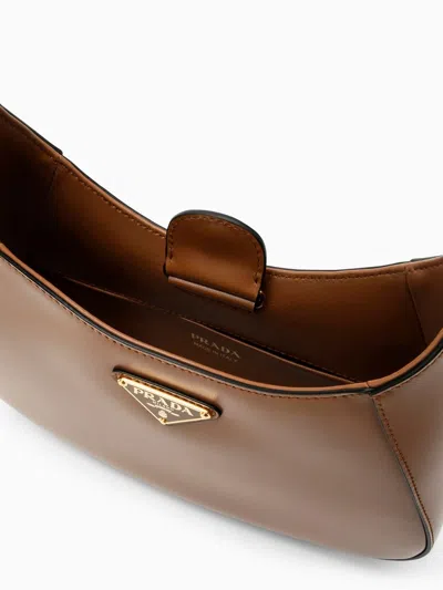 Prada Leather Shoulder Hobo Bag In Brown