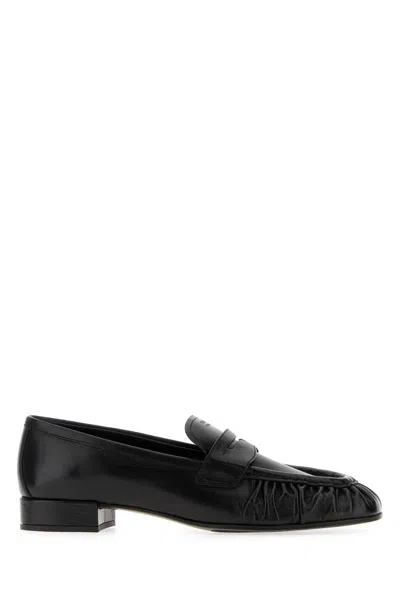 Prada Brushed Leather Loafers In Black