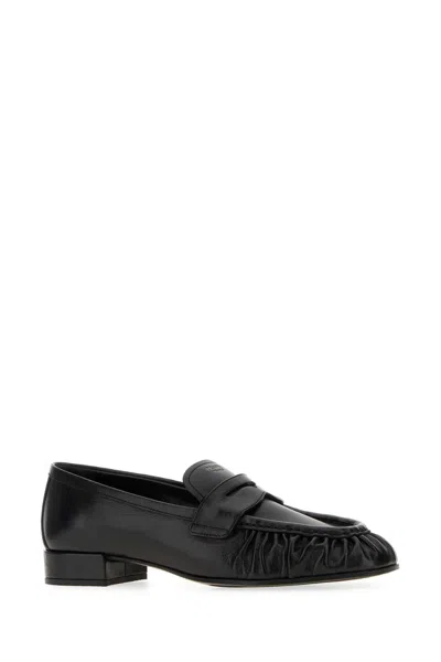 Prada Brushed Leather Loafers In Black