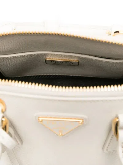 Prada Promenade Saffiano Leather Hand Bags In White