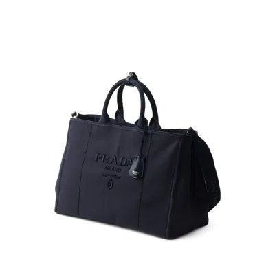 Prada Logo-embossed Tote Bag In Black