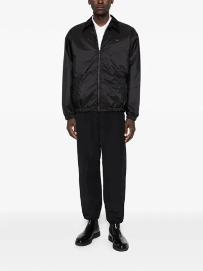 Prada Zipped Nylon Jacket With Logo Embroidery In Black