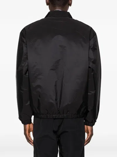 Prada Zipped Nylon Jacket With Logo Embroidery In Black