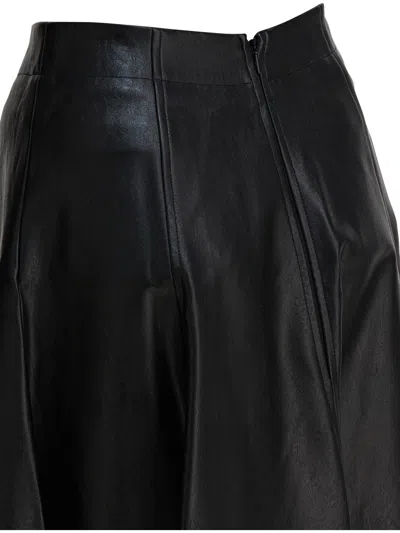 Thelaurent Pleated Midi Skirt In Black