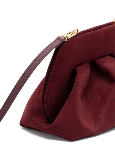 Themoirè Tia Clutch Bag In Plum Suede With Shoulder Strap In Brown