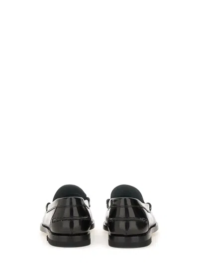 Tod's Calfskin Flat Shoes In Black