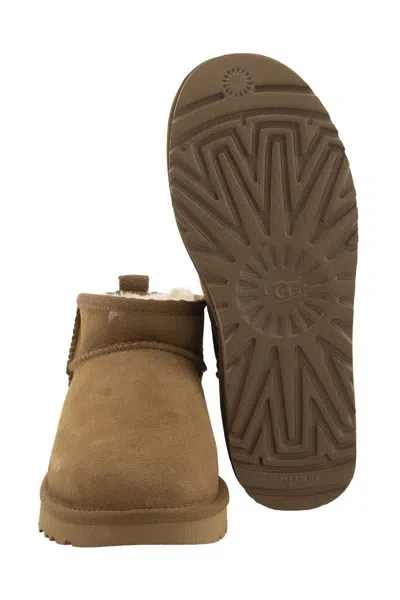 Ugg Classic Ultra Mini Suede Boots For Woman In Brown