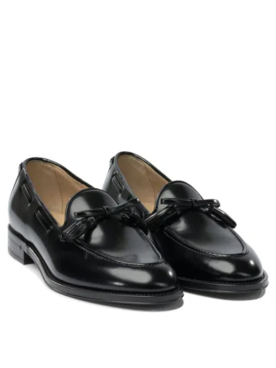 Valentino Garavani Bowshire Loafers In Black Glossy Calfskin
