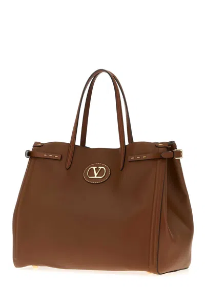 Valentino Garavani Brown Leather Medium Antibes Shopping Bag In Brown