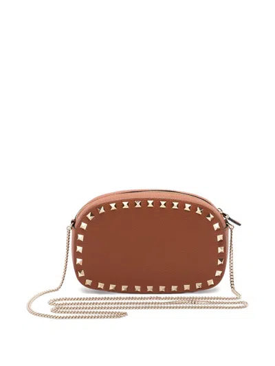 Valentino Garavani Studded Leather Crossbody Bag With Chain Strap In Brown