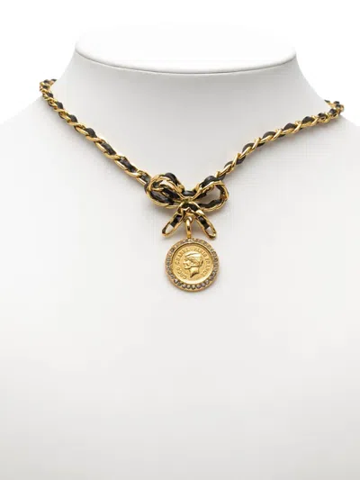 Pre-owned Chanel 1996 Leather And Gold Plated Medallion Bow Pendant Necklace Costume Necklace In Black
