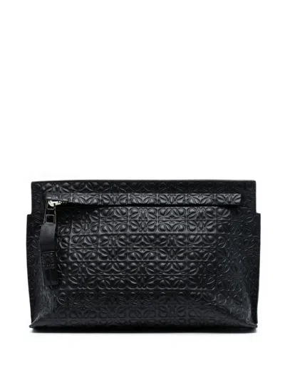 Pre-owned Loewe 2015 Embossed Leather Anagram Repeat T Clutch Bag In Black