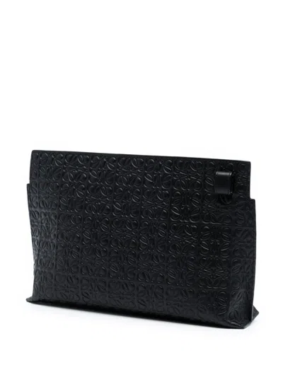 Pre-owned Loewe 2015 Embossed Leather Anagram Repeat T Clutch Bag In Black
