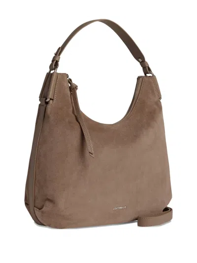 Coccinelle Rebekka Zip-fastening Shoulder Bag In Brown