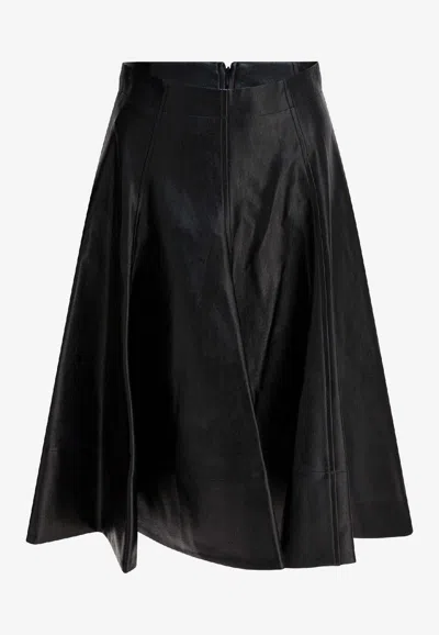 Thelaurent Pleated Midi Skirt In Black