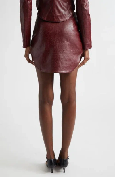Diesel Coated Miniskirt With Embossed Motif In Burgundy